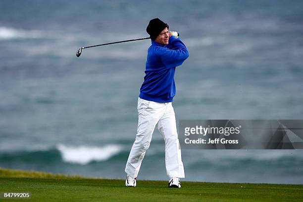 Greg Kinnear hits his second shot on the 18th hole during the third round of the AT&T Pebble Beach National Pro-Am at the Pebble Beach Golf Links on...