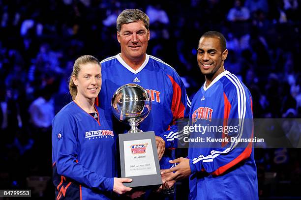 Katie Smith, Bill Laimbeer and Arron Afflalo of Detroit pose with the trophy after winning the Haier Shooting Stars on All-Star Saturday Night, part...