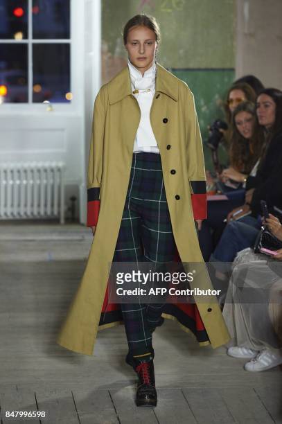 Model presents a creation from the Burberry collection during a catwalk show for the Spring/Summer 2018 collection on the second day of The London...