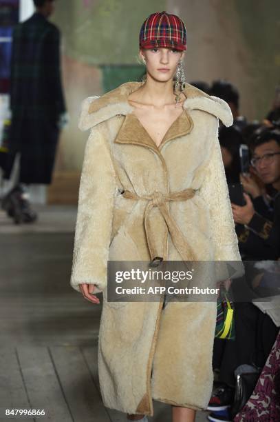 Model presents a creation from the Burberry collection during a catwalk show for the Spring/Summer 2018 collection on the second day of The London...