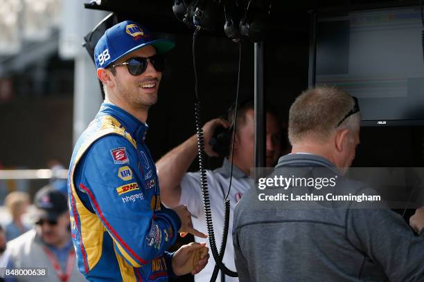 Alexander Rossi of the United States driver of the NAPA Auto Parts Honda chats to his crew during practice on day 2 of the GoPro Grand Prix of Somoma...