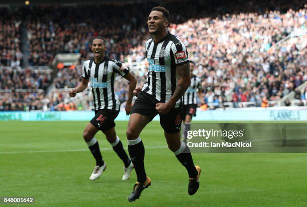 Jamaal Lascelles of Newcastle United celebrates after he scores the winning goal during the Premier League match between Newcastle United and Stoke...