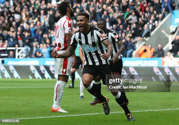 Jamaal Lascelles of Newcastle United celebrates after he scores the winning goal during the Premier League match between Newcastle United and Stoke...