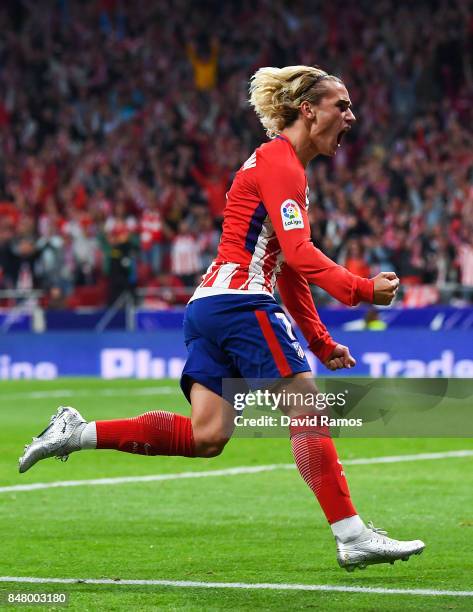 Antoine Griezmann of Club Atletico de Madrid celebrates after scoring his team's first goal during the La Liga match between Atletico Madrid and...