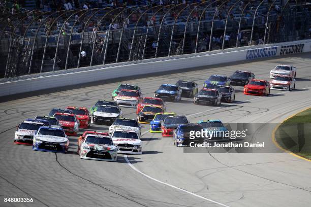 Erik Jones, driver of the NBA 2K18/GameStop Toyota, leads the field into turn one after taking the green flag to start the NASCAR XFINITY Series...