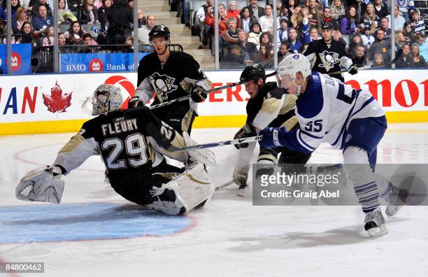 Jason Blake of the Toronto Maple Leafs scores on Marc-Andre Fleury of the Pittsburgh Penguins during game action February 14, 2009 at the Air Canada...
