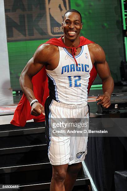 Dwight Howard of the Orlando Magic wears a Superman cape as he participates in the Sprite Slam Dunk Contest on All-Star Saturday Night, part of 2009...