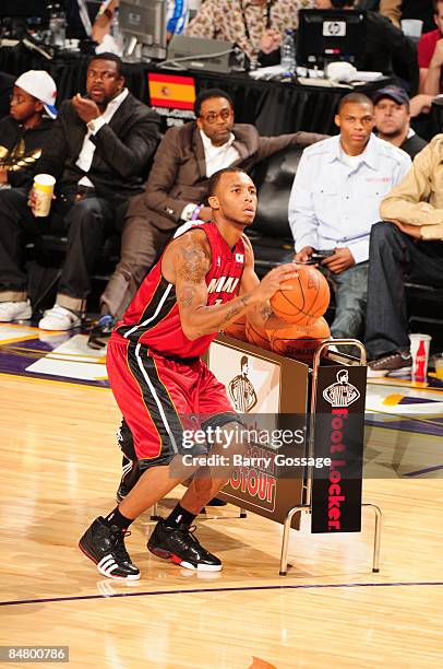 Daequan Cook of the Miami Heat shoots during the Foot Locker Three-Point Shootout as part of 2009 NBA All-Star Weekend at US Airways Center on...