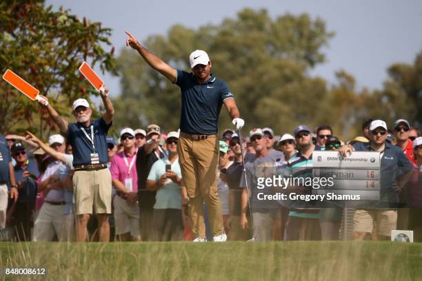 Jason Day of Australia hits his tee shot on the eighth hole during the third round of the BMW Championship at Conway Farms Golf Club on September 16,...
