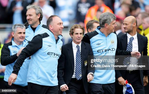 Manchester City Under-21 elite development manager Andy Welsh, goalkeeping coach Massimo Battara , first team coach David Platt , coach Fausto...