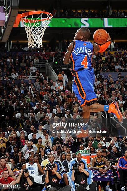 Nate Robinson of the New York Knicks dunks during the Sprite Slam Dunk Contest on All-Star Saturday Night, part of 2009 NBA All-Star Weekend at US...