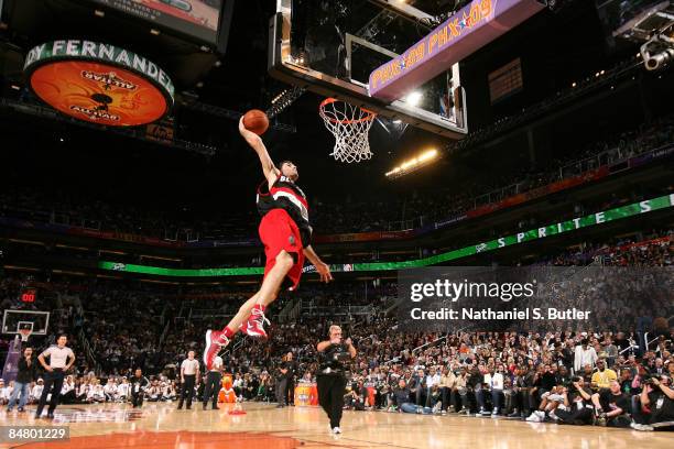 Rudy Fernandez of the Portland Trail Blazers attempts a dunk as he participates in the Sprite Slam Dunk Contest on All-Star Saturday Night, part of...