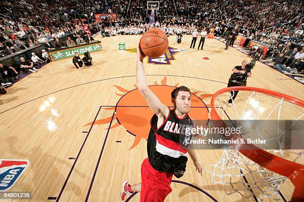 Rudy Fernandez of the Portland Trail Blazers attempts a dunk as he participates in the Sprite Slam Dunk Contest on All-Star Saturday Night, part of...