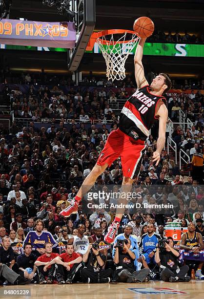Rudy Fernandez of the Portland Trail Blazers attempts a dunk as he participates in the Sprite Slam Dunk Contest on All-Star Saturday Night, part of...