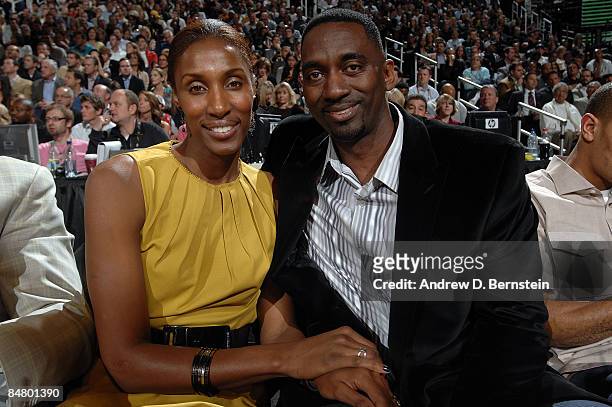 Player Lisa Leslie and husband Michael Lockwood watch the Sprite Slam Dunk Contest on All-Star Saturday Night, part of 2009 NBA All-Star Weekend at...