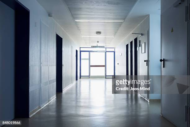 abandoned hospital corridor - hospital corridor stock pictures, royalty-free photos & images