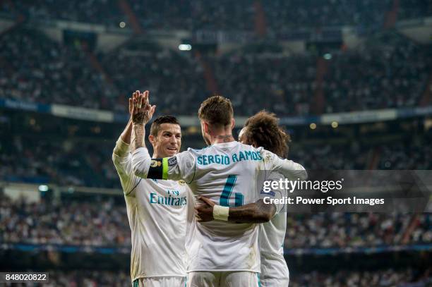 Sergio Ramos of Real Madrid celebrates with teammates Marcelo Vieira Da Silva and Cristiano Ronaldo during the UEFA Champions League 2017-18 match...