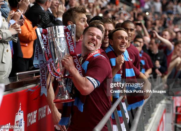 West Ham United's Kevin Nolan celebrates with the Championship Play-Off Trophy