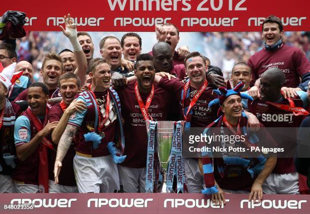 West Ham United players celebrate with the Championship Play-Off Trophy
