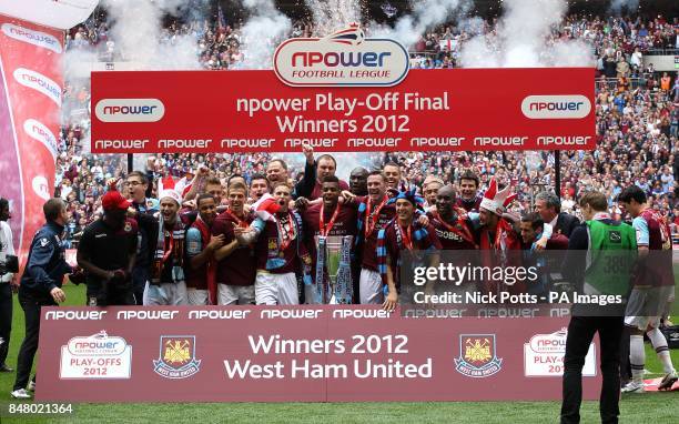 West Ham United players celebrate with the Championship Play-Off Trophy