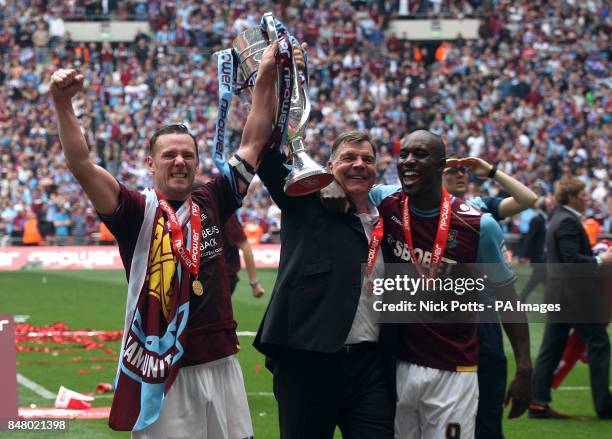 West Ham United's Kevin Nolan , Carlton Cole and manager Sam Allardyce celebrate with the Championship Play-Off Trophy