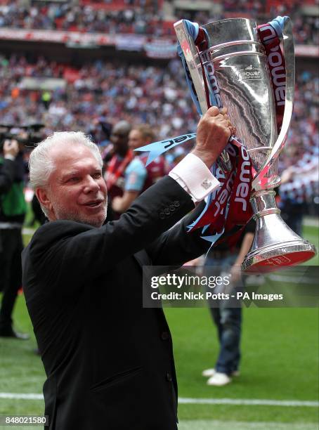 West Ham United co-owner David Gold celebrates with the Championship Play-Off Trophy