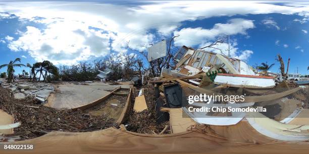 Recreational vehicle trailers remain blown open and scattered at the Sunshine Key RV Resort and Marina five days after Hurricane Irma slammed into...