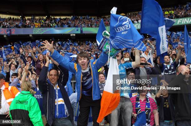 Leinster fans celebrate their teams victory during the Heinken Cup Final at Twickenham, London.