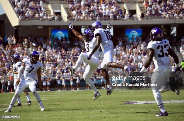Shaun Nixon of the TCU Horned Frogs celebrates a touchdown with Jalen Reagor of the TCU Horned Frogs in the first half against the Southern Methodist...