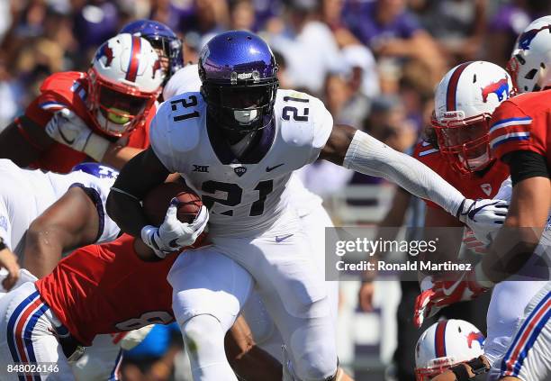 Kyle Hicks of the TCU Horned Frogs runs the ball against the Southern Methodist Mustangs at Amon G. Carter Stadium on September 16, 2017 in Fort...