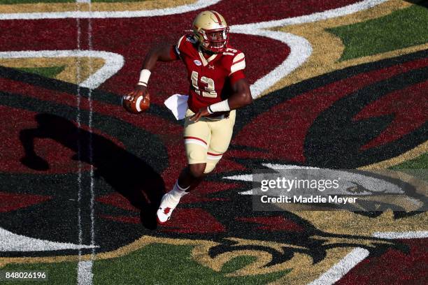 Anthony Brown of the Boston College Eagles looks for a pass against the Notre Dame Fighting Irish during the first half at Alumni Stadium on...