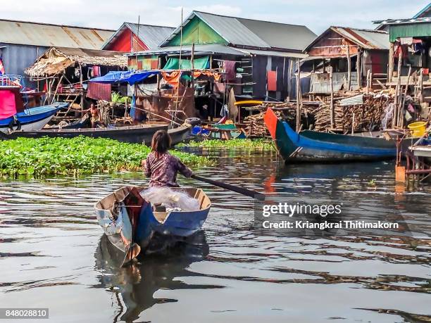 view of life in tonle sap lake in cambodia. - tonle sap stock pictures, royalty-free photos & images