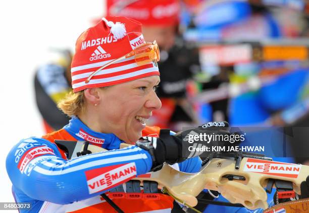 Olga Zaitseva of Russia shoots during the women's 10 km pursuit event at the IBU World Biathlon Championships in Pyeongchang, east of Seoul on...