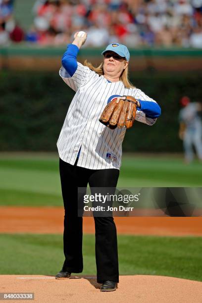 Actress Bonnie Hunt throws out a ceremonial first pitch before the game between the Chicago Cubs and the St. Louis Cardinals at Wrigley Field on...