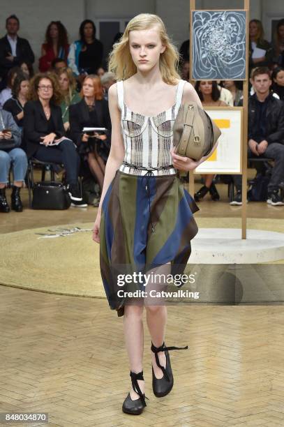 Model walks the runway at the J.W.Anderson Spring Summer 2018 fashion show during London Fashion Week on September 16, 2017 in London, United Kingdom.