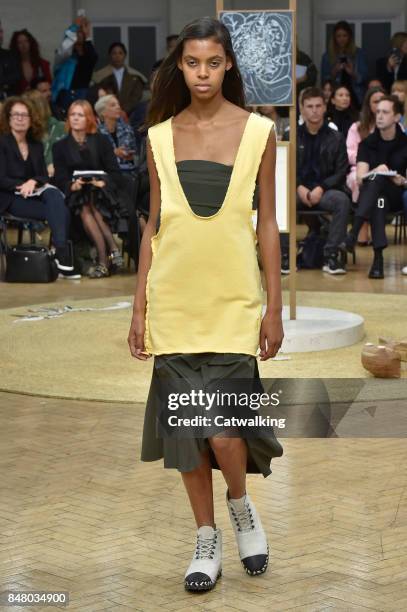 Model walks the runway at the J.W.Anderson Spring Summer 2018 fashion show during London Fashion Week on September 16, 2017 in London, United Kingdom.