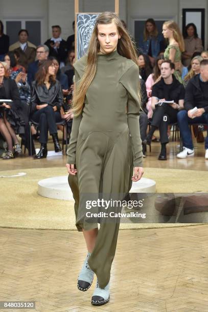 Model walks the runway at the J.W.Anderson Spring Summer 2018 fashion show during London Fashion Week on September 16, 2017 in London, United Kingdom.