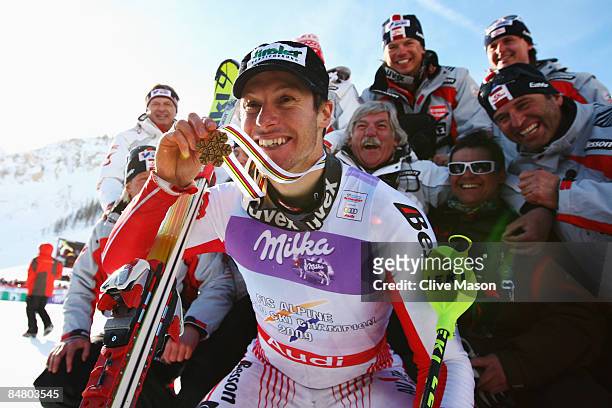 Gold medal winner Manfred Pranger of Austria celebrates with Austrian team mates at the Medal Ceremony following the Men's Slalom event held on the...