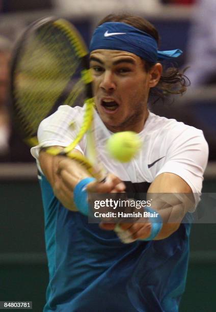 Rafael Nadal of Spain plays a backhand during the singles final match against Andy Murray of Great Britain during day seven of the ABN AMRO World...