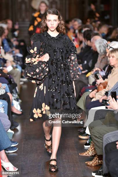 Model walks the runway at the Simone Rocha Spring Summer 2018 fashion show during London Fashion Week on September 16, 2017 in London, United Kingdom.