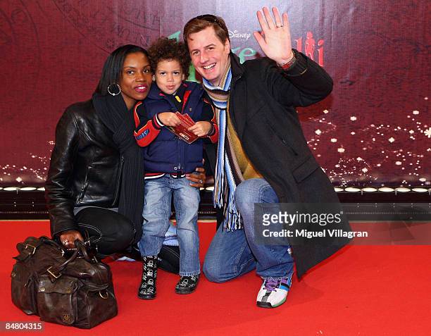 Stephanie Stewart , Florian Simbeck and their son pose for the media during the premiere of the movie 'Lilli The Witch - The Dragon And The Magical...
