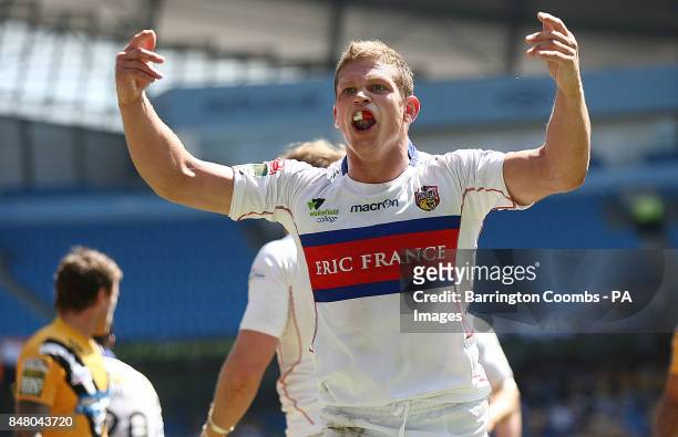 Wakefield Wildcats' Peter Fox celebrates scoring a try against Castleford Tigers during the Stobart Super League, Magic Weekend match at the Etihad...