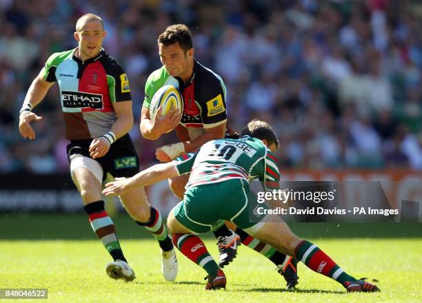 Harlequins George Lowe is tackled by Leicester's George Ford during the Aviva Premiership Final at Twickenham Stadium, London.