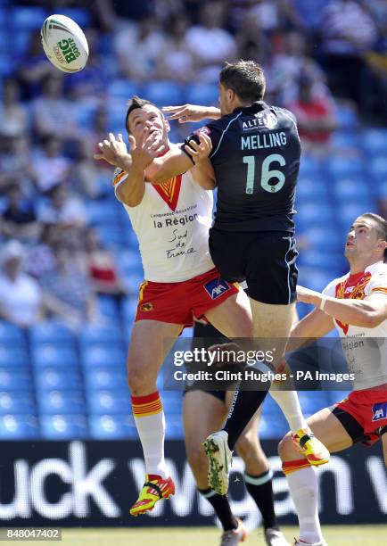 Catalan Dragons' Clint Greenshields and London Broncos' Chris Melling challenge for a high ball during the Stobart Super League, Magic Weekend match...