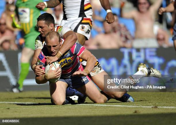 Leeds Rhinos's Carl Ablett scores the fifth try of the game for his side during the Stobart Super League, Magic Weekend match at the Etihad Stadium,...