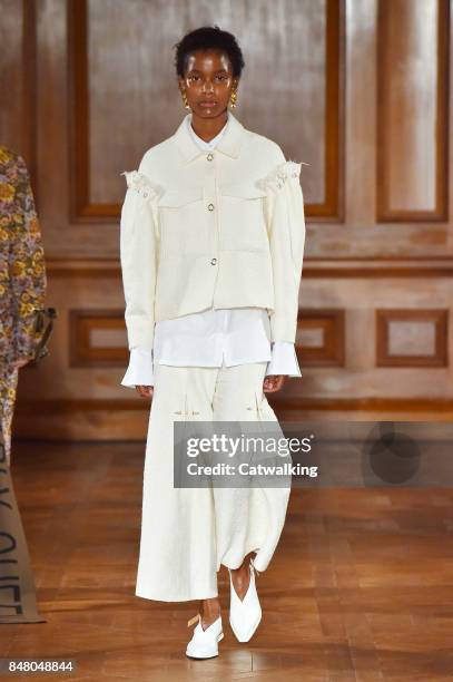 Model walks the runway at the Mother of Pearl Spring Summer 2018 fashion show during London Fashion Week on September 16, 2017 in London, United...