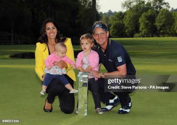 England's Luke Donald celebrates winning the BMW PGA Championship with his wife Diane Antonopoulos and his children Elle and Sophia at Wentworth Golf...
