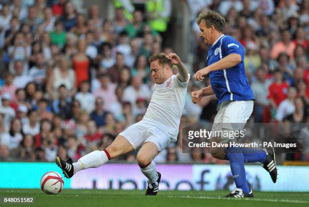 Olly Murs and Gordon Ramsay during the match at Old Trafford for Soccer Aid.