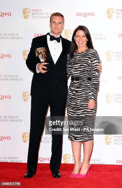 Winner of the best male performance in a comedy programme Darren Boyd with Davina McCall at the Arqiva British Academy Television Awards 2012 at the...