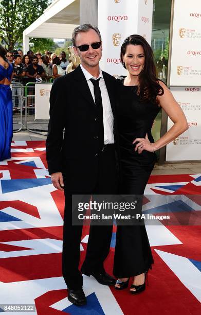 John Simm and Kate Magowan arriving for the 2012 Arqiva British Academy Television Awards at the Royal Festival Hall, London
